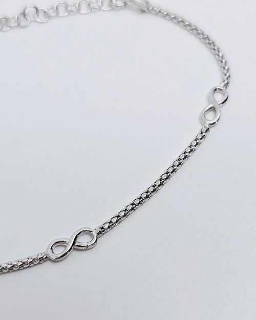 Bracciale donna argento 925% rodiato con simboli infinito